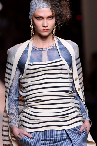 Illustration for article titled Jean-Paul Gaultier: Brights, Bras, Bellies, And Braids